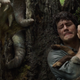 Joel Dawson (Dylan O’Brien) dodges a giant monster while sneaking through the wilderness.
